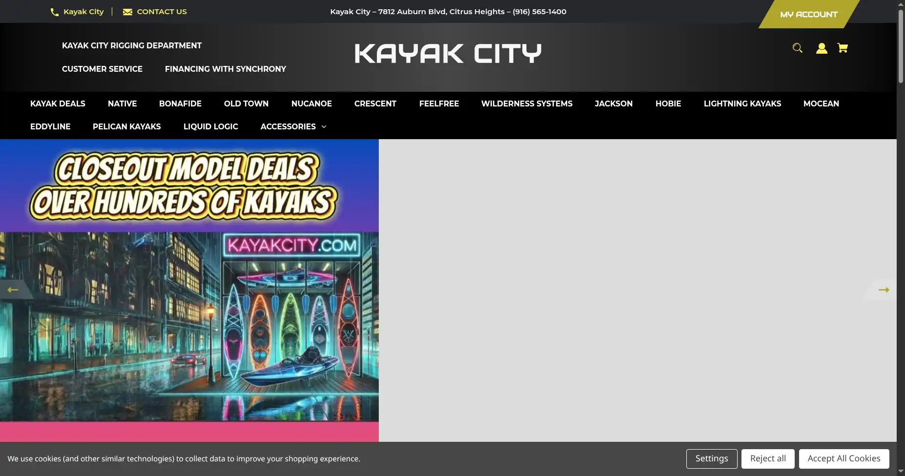 The old kayakcity.com homepage: cluttered navigation, broken carousel, cookie banner